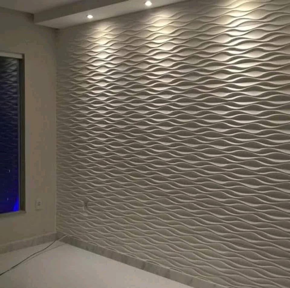 Painel 3D decorativo em gesso no hall de entrada